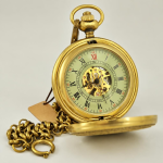 Reloj de bolsillo de cobre mecánico con motivos florales