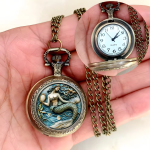 Reloj de bolsillo de cuarzo ilustrado — Sirena, metal bronce dorado
