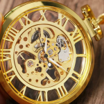Reloj de bolsillo esqueleto dorado de cuerda manual