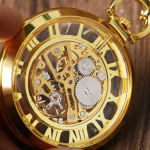 Reloj de bolsillo esqueleto dorado de cuerda manual