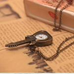 Reloj de bolsillo quartz con forma de guitarra eléctrica