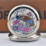 Reloj de bolsillo steampunk con esfera de pavo real