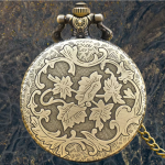 Reloj de bolsillo steampunk de bronce con árbol del mundo