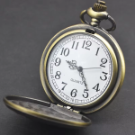 Reloj de bolsillo steampunk de bronce con tapa de concha
