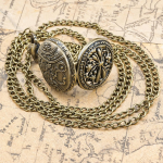 Reloj de bolsillo steampunk en tono bronce con cadena